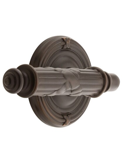 Ribbon and Reed Door Set With Lever Handles Left Hand in Oil Rubbed Bronze.